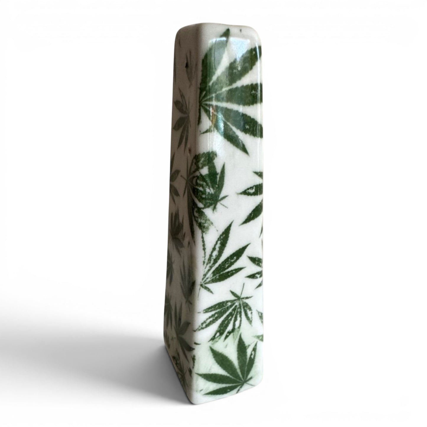 Rock N Art Shop hand-decorated stoneware tobacco pipe with green cannabis leaf design on white ceramic.