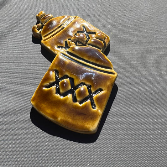 XXX Moonshine Jug Ceramic Magnet – Amber Brown