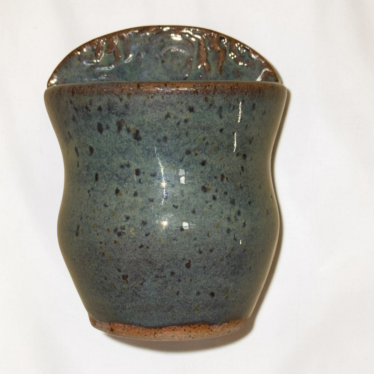 Rock N Art Shop handmade blue-green speckled stoneware wall pocket vase with a textured impressed backplate.