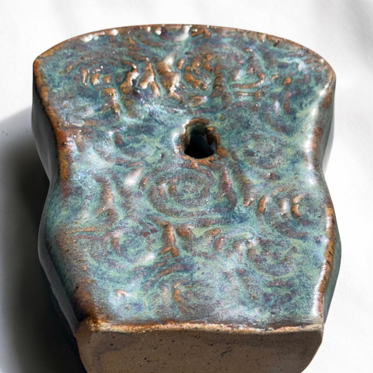 Rock N Art Shop handmade speckled stoneware wall pocket vase with a textured blue-green glaze and hanging hole