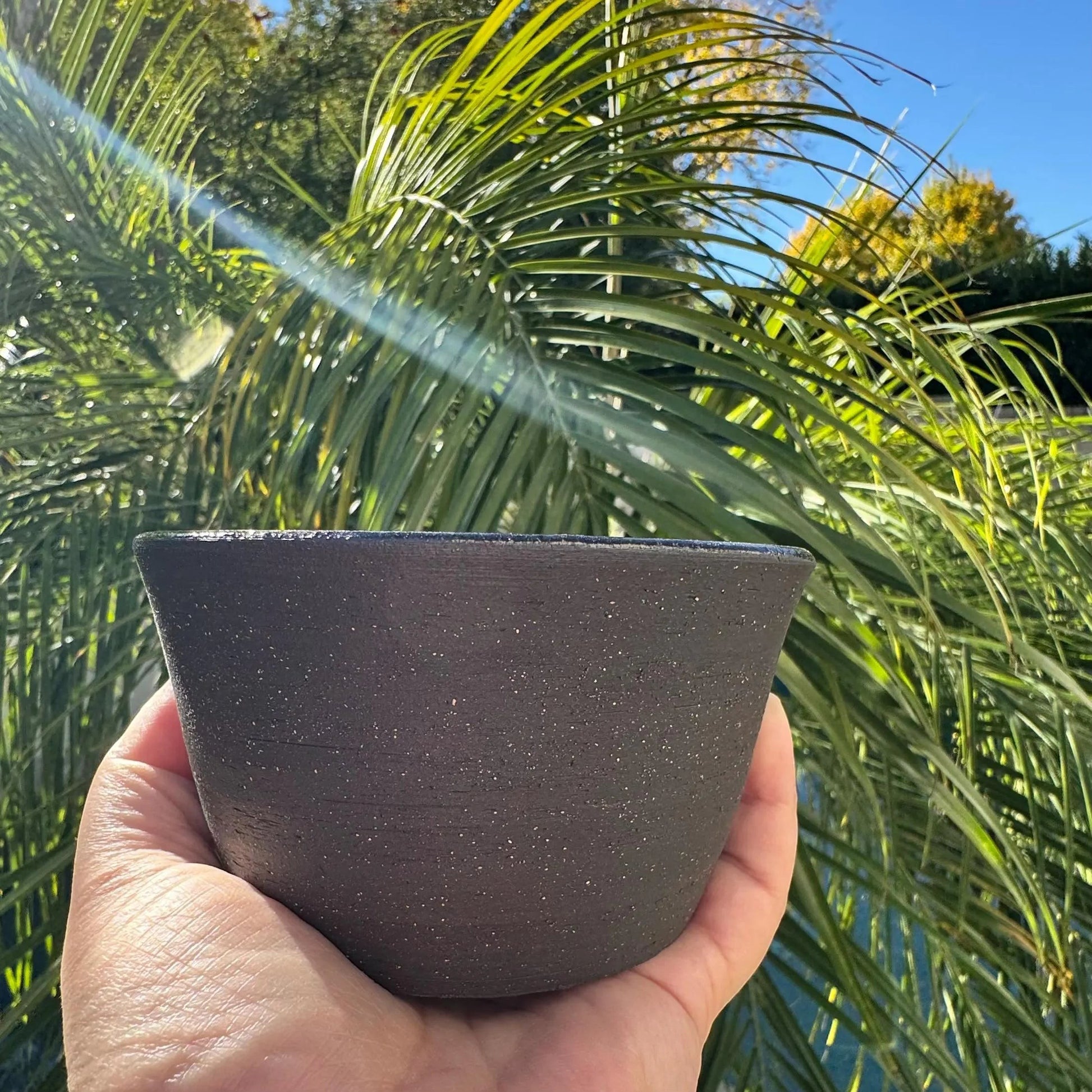 Rock N Art Shop handmade black clay ceramic bowl with iron lustre glaze, 1 cup capacity, perfect for snacks or sauces.