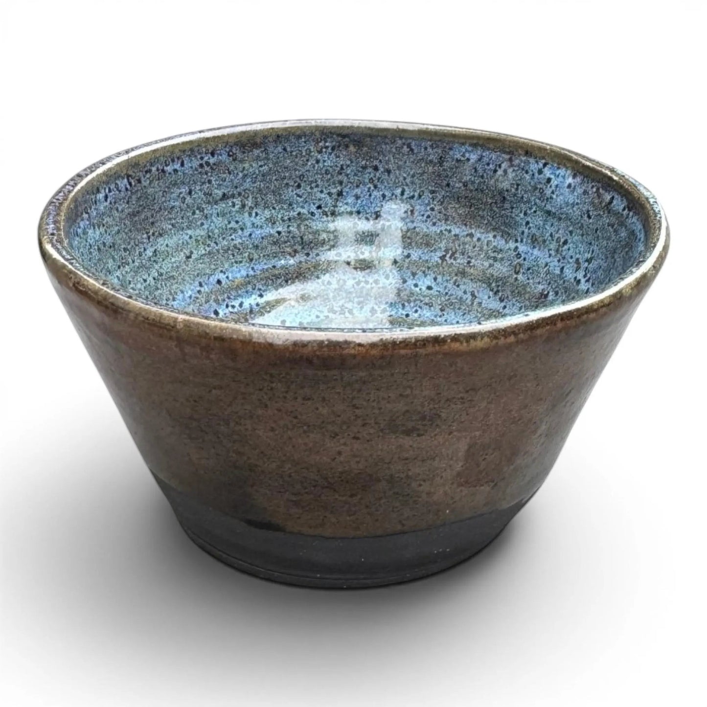 Rock N Art Shop large black stoneware bowl with blue and copper glaze. Wheel thrown pottery.