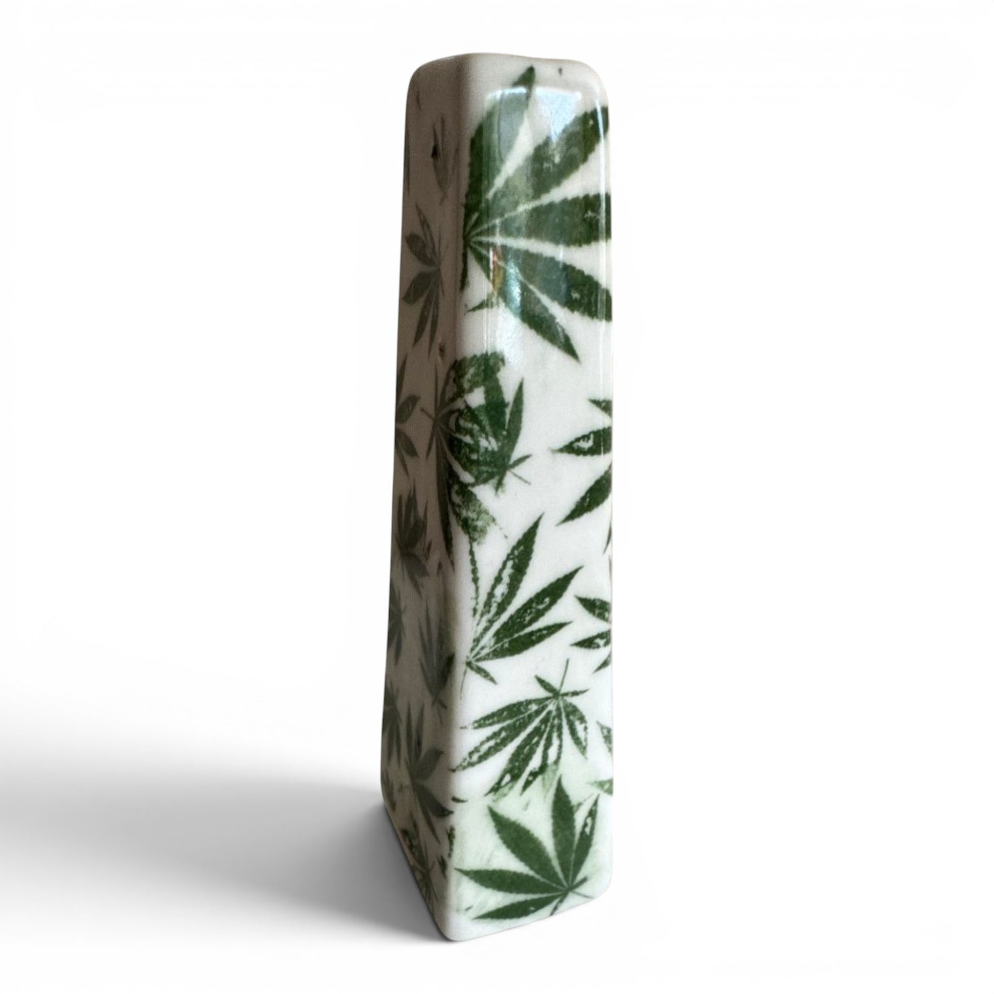 Rock N Art Shop hand-decorated stoneware tobacco pipe with green cannabis leaf design on white ceramic.