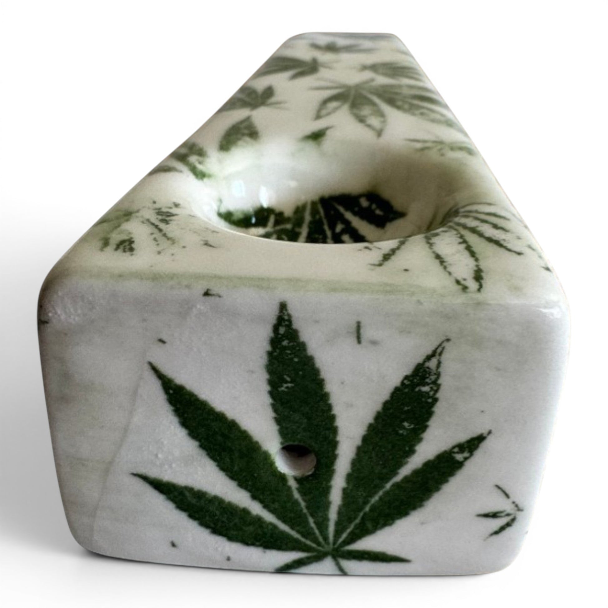 Rock N Art Shop hand decorated stoneware tobacco pipe with green cannabis leaf design on white ceramic.