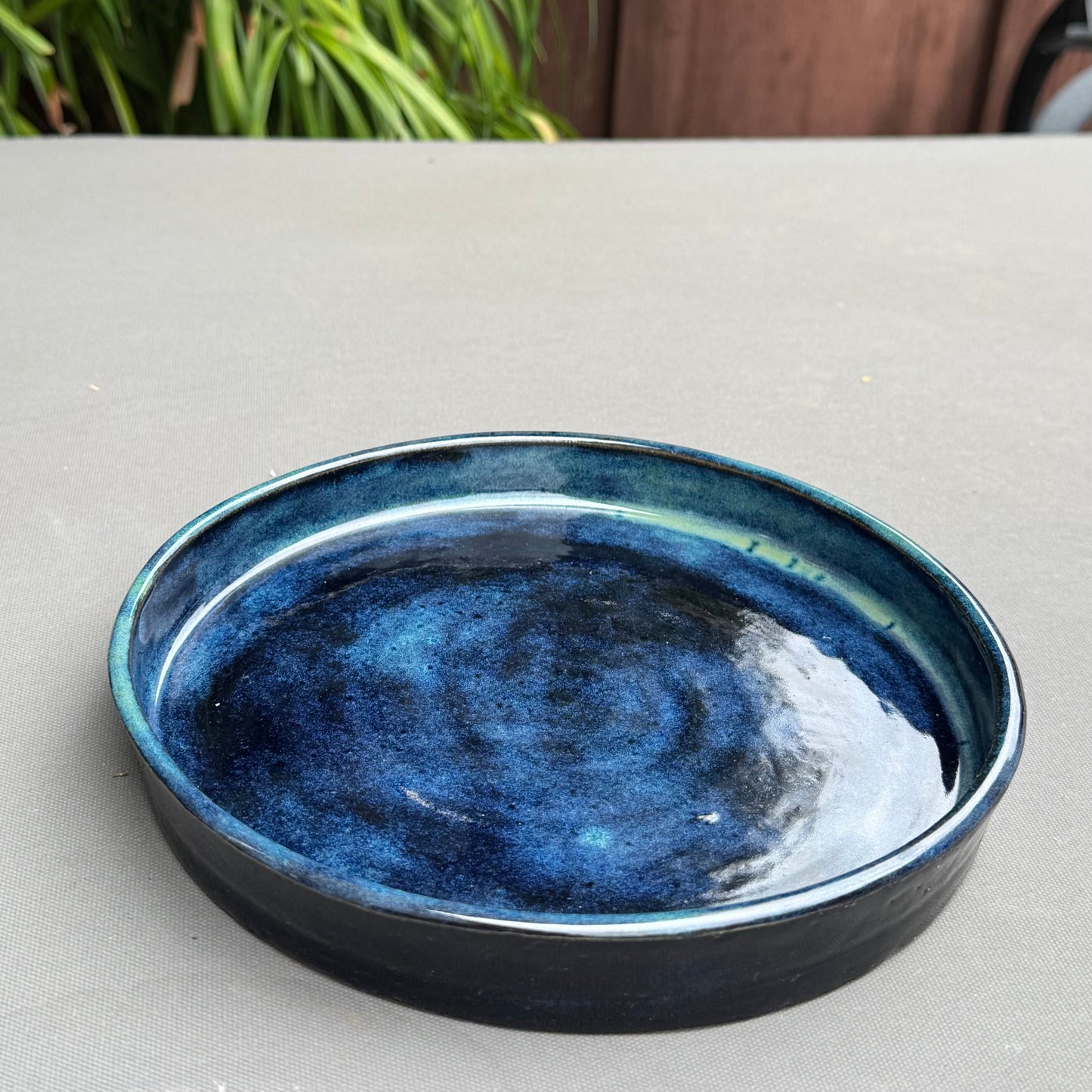 Rock N Art Shop handmade ceramic saucer in blue and turquoise glaze with a glossy finish for a berry bowl set