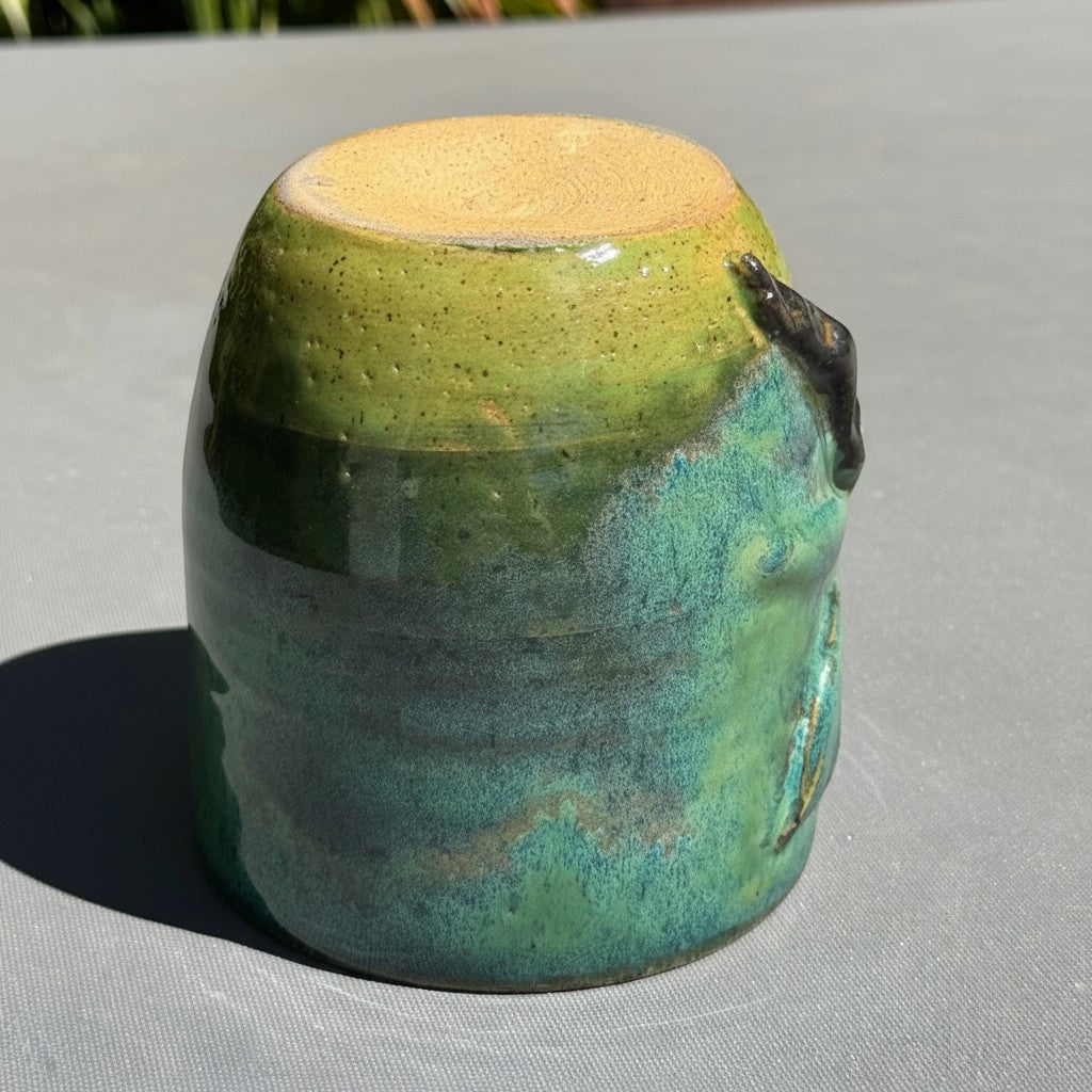 Rock N Art Shop handmade stoneware tumbler in turquoise and green glaze with a sculpted dragonfly detail