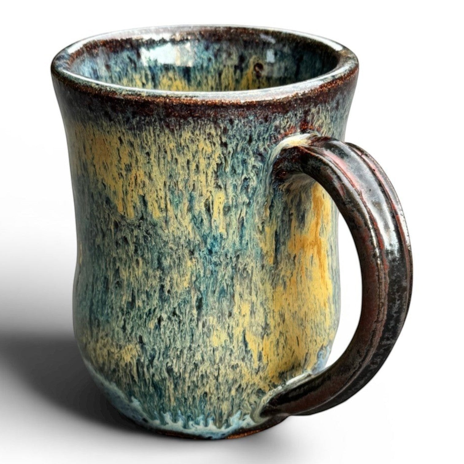 Rock N Art Shop handmade stoneware mug with blue, gold, and green drip glaze. Rustic wheel-thrown pottery, 14 oz.