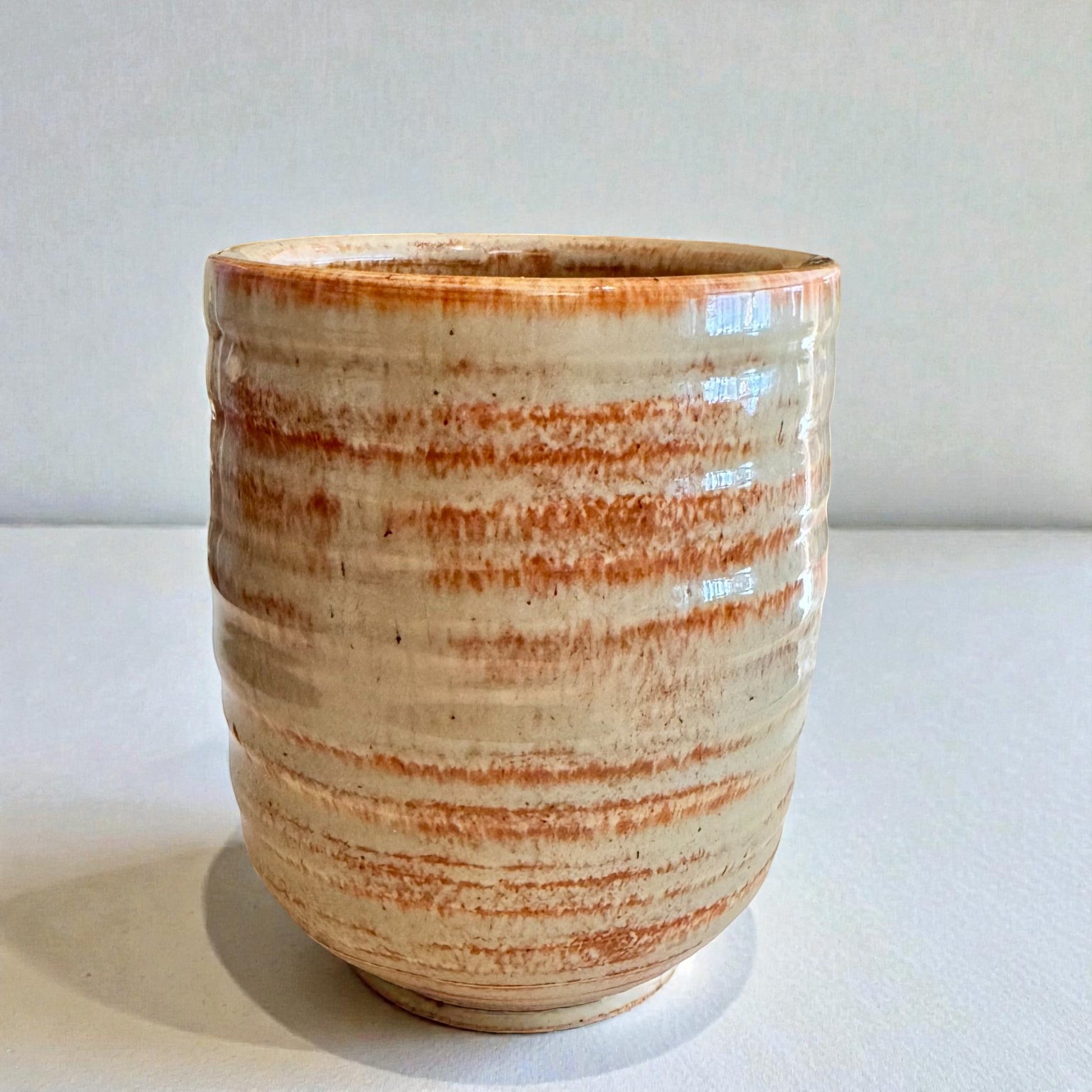 Rock N Art Shop handmade stoneware cocktail tumbler with earthy glaze and horizontal texture. 12 oz capacity.
