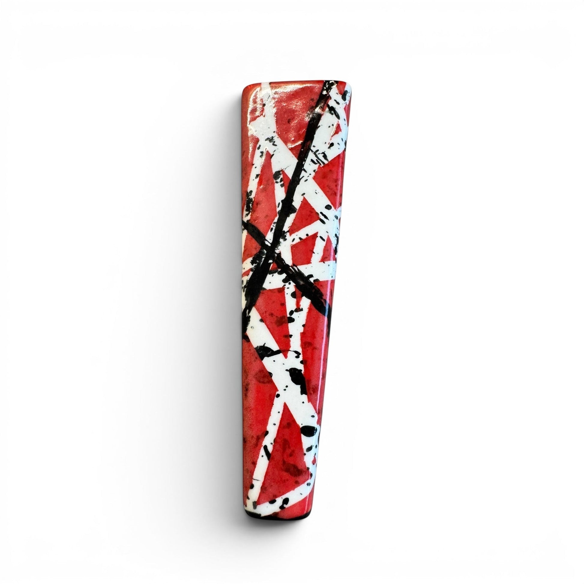 Rock N Art Shop hand-decorated stoneware tobacco pipe with red, black, and white diagonal stripe design and black splatter accents.