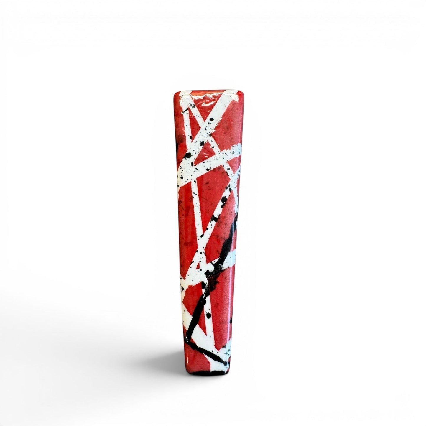 Rock N Art Shop hand-decorated stoneware tobacco pipe with red, black, and white diagonal stripe design and black splatter accents.