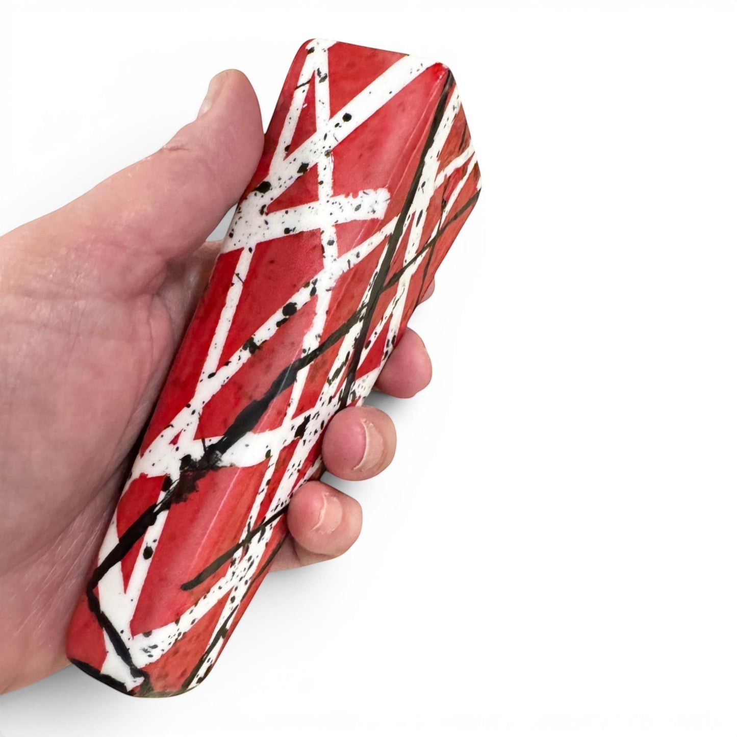 Rock N Art Shop hand-decorated stoneware tobacco pipe with red, black, and white diagonal stripes and black splatter accents.