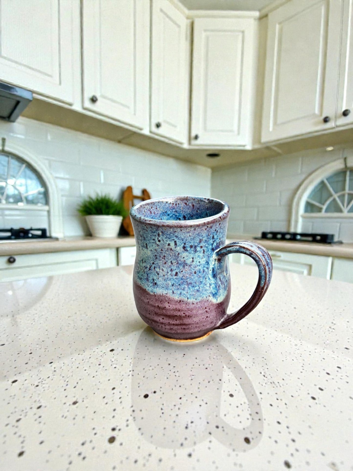 Rock N Art Shop handmade 14 oz ceramic mug, speckled blue and plum glaze, wheel-thrown stoneware, rustic artisan coffee cup.