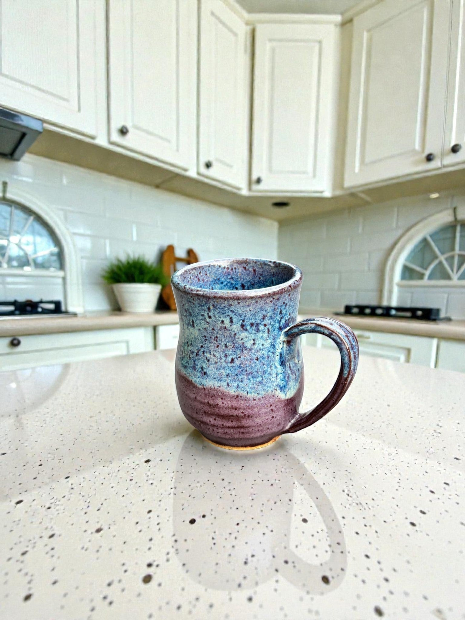 Rock N Art Shop handmade 14 oz ceramic mug, speckled blue and plum glaze, wheel-thrown stoneware, rustic artisan coffee cup.