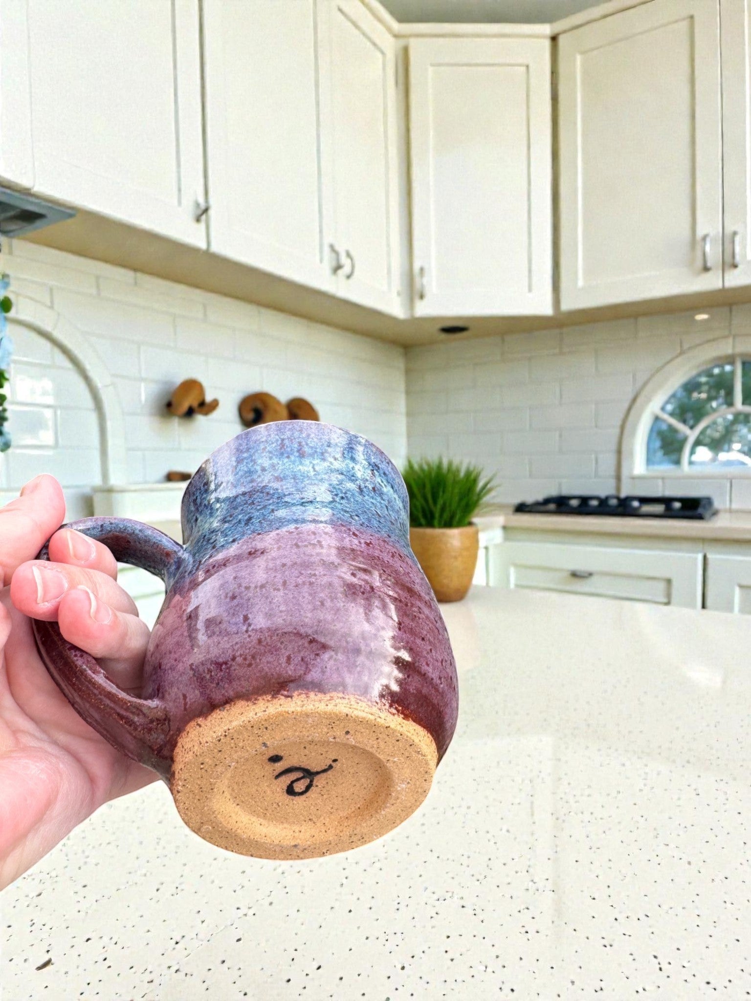 Rock N Art Shop handmade 14 oz ceramic mug, wheel thrown stoneware in speckled blue and plum glaze.