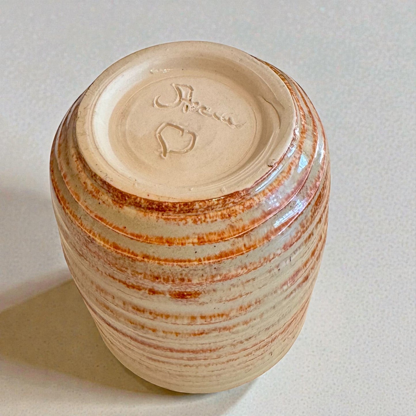 Rock N Art Shop handmade stoneware cocktail tumbler with earthy glaze and horizontal texture. 12 oz capacity.